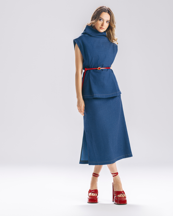 Model wearing Hüna Orchid Set — lightweight denim-blend top and skirt, limited edition design with sculptural silhouette