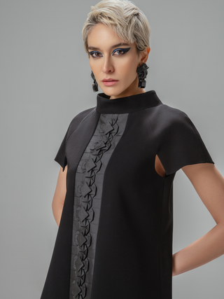 Close-up of Hüna Sakura Dress — handmade origami detailing on premium crepe fabric, limited edition piece