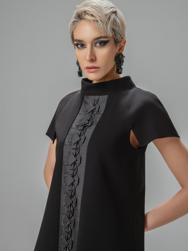 Close-up of Hüna Sakura Dress — handmade origami detailing on premium crepe fabric, limited edition piece